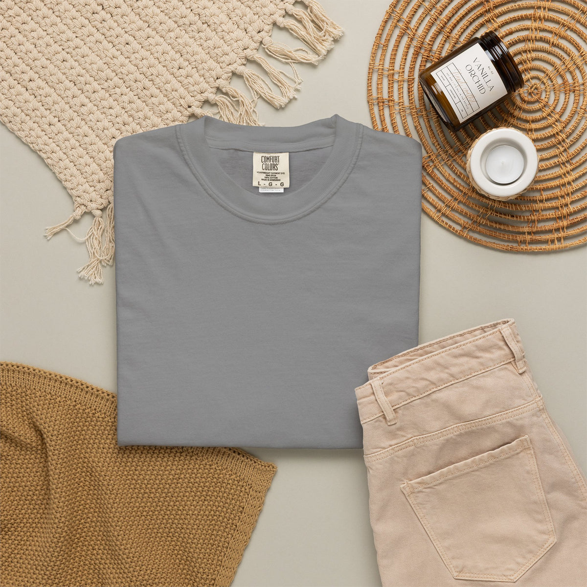 Japanese Speed Car Tee in Grey, folded shirt flat lay on a woven mat
