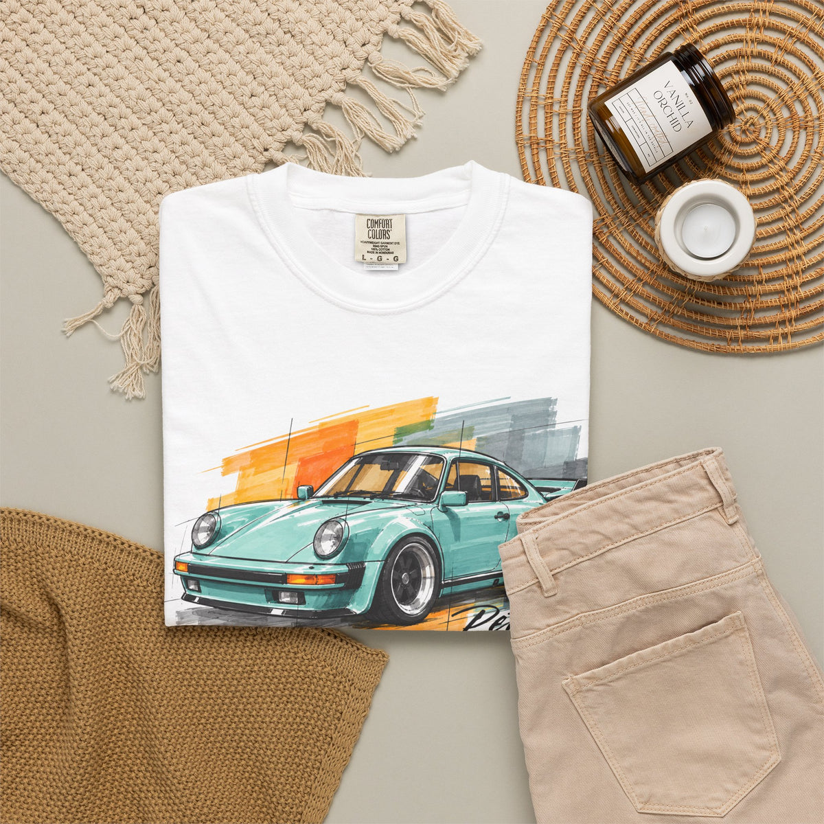 Vintage Coupe Car Tee in White, flat lay with decor props showing the mint coupe print on the front